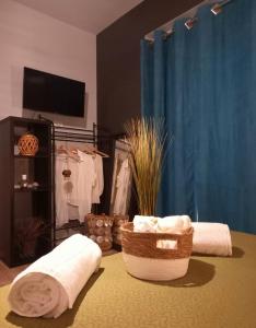 A bed or beds in a room at B&B DOMUS 65
