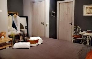 A bed or beds in a room at B&B DOMUS 65