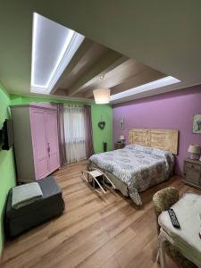 Postel nebo postele na pokoji v ubytování B&B Casa Caporali