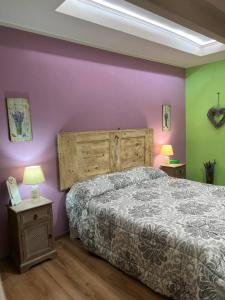 Postel nebo postele na pokoji v ubytování B&B Casa Caporali