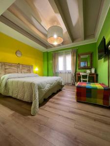 Postel nebo postele na pokoji v ubytování B&B Casa Caporali