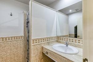 Kúpeľňa v ubytovaní Family villa in Torremirona Resort