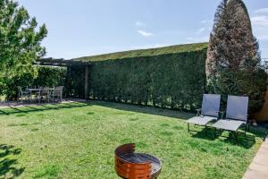 Vonkajšia záhrada v ubytovaní Family villa in Torremirona Resort