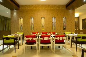 Posezení v ubytování Poppys Hotel Madurai