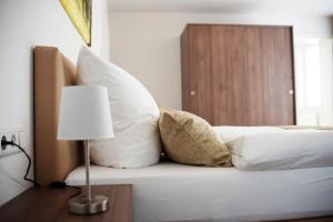 Postel nebo postele na pokoji v ubytování Auerhahn Nest
