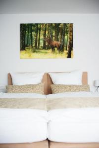 Postel nebo postele na pokoji v ubytování Auerhahn Nest