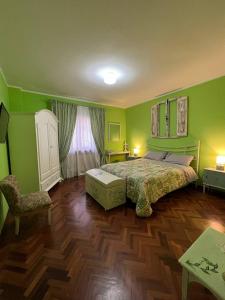 Postel nebo postele na pokoji v ubytování B&B Casa Caporali