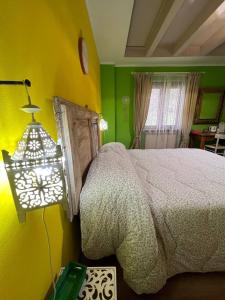 Postel nebo postele na pokoji v ubytování B&B Casa Caporali