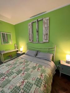 Postel nebo postele na pokoji v ubytování B&B Casa Caporali