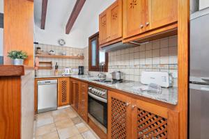 Kuchyň nebo kuchyňský kout v ubytování Sa Lluna