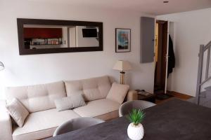 Posedenie v ubytovaní Appartement Duplex Cosy au calme à 50m de la plage