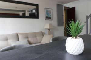 Posedenie v ubytovaní Appartement Duplex Cosy au calme à 50m de la plage