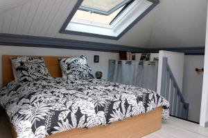 Posteľ alebo postele v izbe v ubytovaní Appartement Duplex Cosy au calme à 50m de la plage