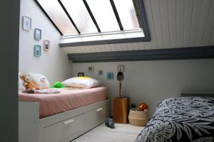 Posteľ alebo postele v izbe v ubytovaní Appartement Duplex Cosy au calme à 50m de la plage