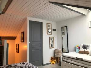Posteľ alebo postele v izbe v ubytovaní Appartement Duplex Cosy au calme à 50m de la plage