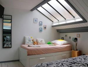 Posteľ alebo postele v izbe v ubytovaní Appartement Duplex Cosy au calme à 50m de la plage