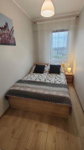 Posteľ alebo postele v izbe v ubytovaní Apartament Korazone ZATOR
