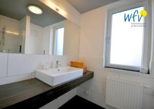 Koupelna v ubytování Barons Residenz Ferienwohnung 1