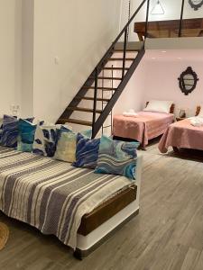 Ένα ή περισσότερα κρεβάτια σε δωμάτιο στο Galanos Katoikies
