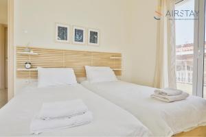 Postel nebo postele na pokoji v ubytování Nautilus Apartments Airport by Airstay