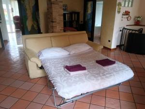 Posteľ alebo postele v izbe v ubytovaní La Villa Del Cedro