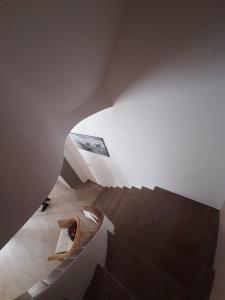 a view from the top of a stairs in a room at Casa Incanto Marina Bis in Marina di Ragusa