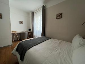 Postel nebo postele na pokoji v ubytování Résidence Natura
