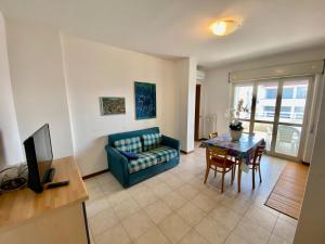 Posezení v ubytování Appartamento Vista Mare con Spiaggia e Piscina