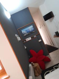 En tv och/eller ett underhållningssystem på Portico 32 - Merano centro