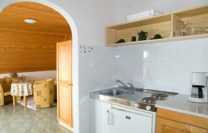 a kitchen with a sink and a counter top at Williams Haus in Hévíz