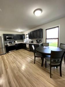 a kitchen with a table and chairs in a room at Mexico Point Ranch in Mexico