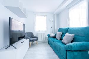 Telewizja i/lub zestaw kina domowego w obiekcie El Ancla de Bermeo By Urdaibai Rentals