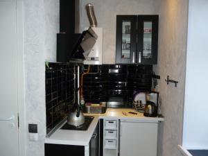 Een keuken of kitchenette bij Modern Apartments