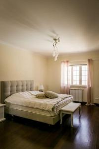 Säng eller sängar i ett rum på Villa Ramiro