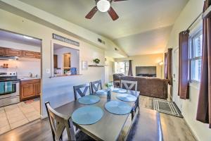 a dining room and kitchen with a table and chairs at Norfolk Vacation Rental Patio, 3 Mi to Beaches! in Norfolk