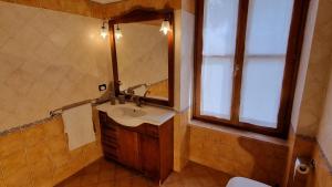 Een badkamer bij Casa Chiara a Valeggio sul Mincio +19 foto's