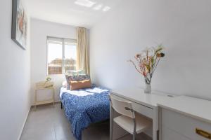 Postel nebo postele na pokoji v ubytování Apartamento con terraza centrico