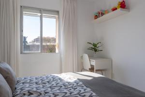 Postel nebo postele na pokoji v ubytování Apartamento con terraza centrico