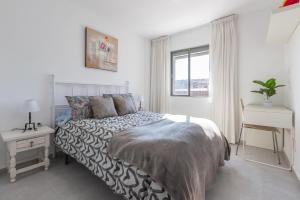 Postel nebo postele na pokoji v ubytování Apartamento con terraza centrico