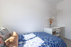 Postel nebo postele na pokoji v ubytování Apartamento con terraza centrico