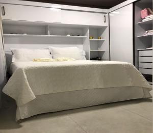 Postel nebo postele na pokoji v ubytování Apartamento Aconchegante