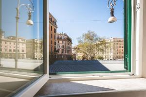 an open window with a view of a street at TH Trastevere Luxury-S.Cosimato 2bd-2bt in Rome