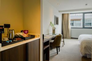 Postel nebo postele na pokoji v ubytování JM Suites Hotel Eco-Friendly Casablanca + 37 fotografií
