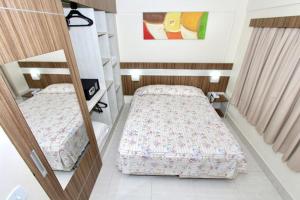 a view of a bedroom with two bunk beds at Lacqua Di'Roma Parque - CN M in Caldas Novas