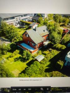 ein Modell eines Hauses mit Garten in der Unterkunft LIA in Lorenskog