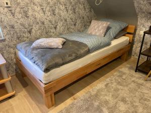 Postel nebo postele na pokoji v ubytování Haus Lotusblüte