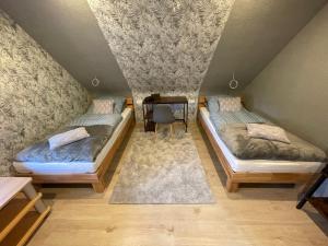 Postel nebo postele na pokoji v ubytování Haus Lotusblüte