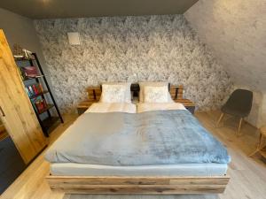 Postel nebo postele na pokoji v ubytování Haus Lotusblüte
