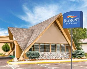 a walmart sign in front of a building at Baymont by Wyndham Bay City in Bay City