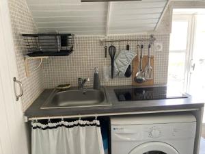 Kuchnia lub aneks kuchenny w obiekcie Logis côté Cour